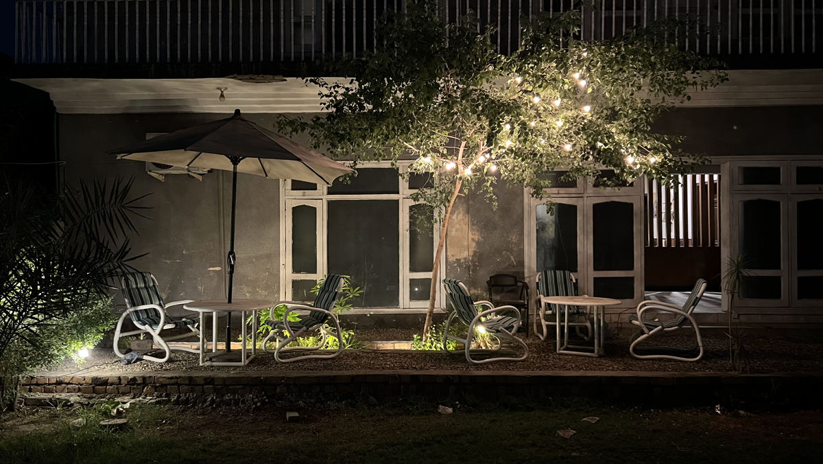 Courtyard patio seating under string lights